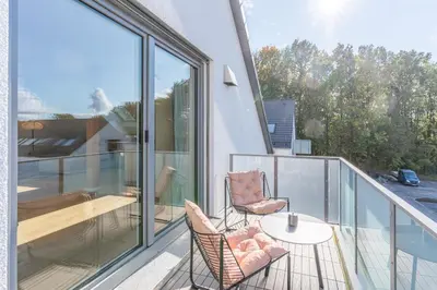 Ein Balkon oder eine Terrasse in der Unterkunft Modernes Apartment in Langenbach bei München, nahe Flughafen München