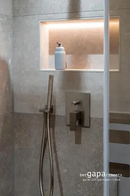 Ein Badezimmer in der Unterkunft BergAlpine
