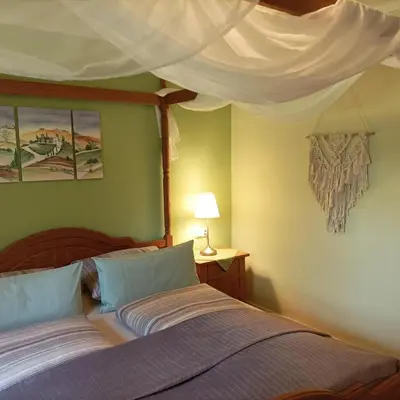 Ein Bett oder Betten in einem Zimmer der Unterkunft Ferienwohnung Ilona, Armin & Simon Funke