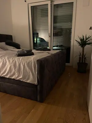 Ein Bett oder Betten in einem Zimmer der Unterkunft Luxury City Apartment in Munich