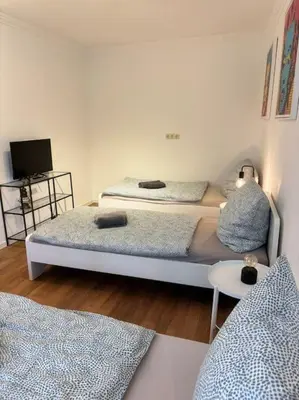 Ein Bett oder Betten in einem Zimmer der Unterkunft Zentrum - am Dom - Wohnung
