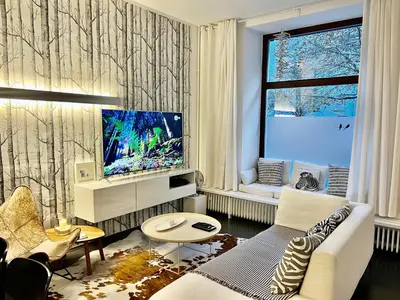 TV/Unterhaltungsangebot in der Unterkunft Cocoma-Design-Apartment Deluxe - very central