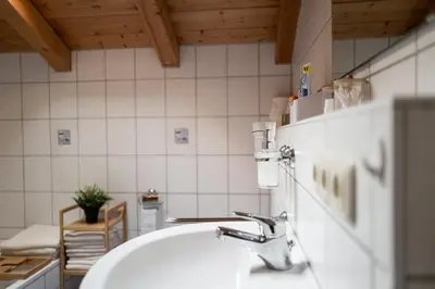 Ein Badezimmer in der Unterkunft Achentaler Alpentor
