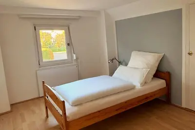 Ein Bett oder Betten in einem Zimmer der Unterkunft My Bavarian Home