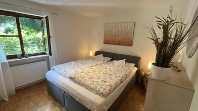 Ein Bett oder Betten in einem Zimmer der Unterkunft Tegernsee Perle