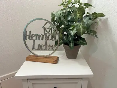 Ein Zertifikat, Auszeichnung, Logo oder anderes Dokument, das in der Unterkunft Tegernsee Perle ausgestellt ist