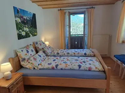 Ein Bett oder Betten in einem Zimmer der Unterkunft Ferienwohnung Schwarzenberger