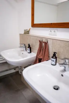 Ein Badezimmer in der Unterkunft Pilgerhaus Wildsteig