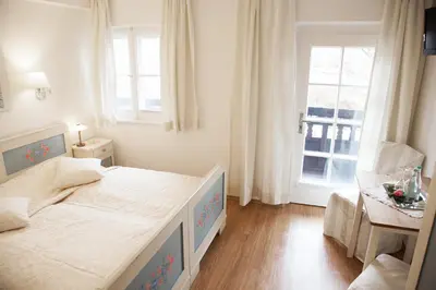 Ein Bett oder Betten in einem Zimmer der Unterkunft Hotel Garni Georgenhof Adults Only