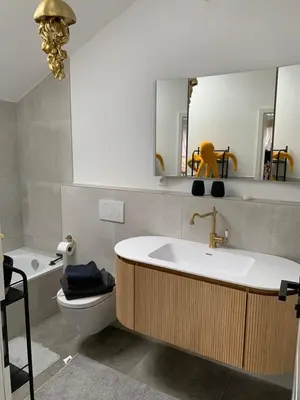 Ein Badezimmer in der Unterkunft Murmelbau