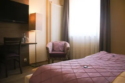 Ein Bett oder Betten in einem Zimmer der Unterkunft Boutique Hotel zur Post