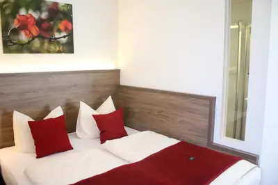 Ein Bett oder Betten in einem Zimmer der Unterkunft Boutique Hotel zur Post