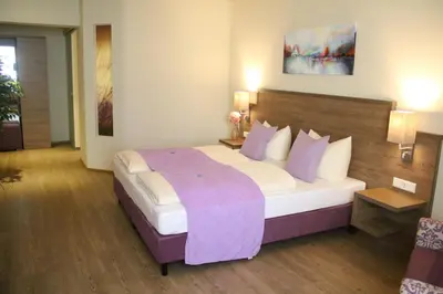 Ein Bett oder Betten in einem Zimmer der Unterkunft Boutique Hotel zur Post