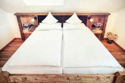 Ein Bett oder Betten in einem Zimmer der Unterkunft Gasthaus Georg Ludwig Maising