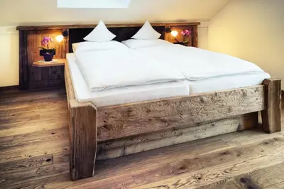 Ein Bett oder Betten in einem Zimmer der Unterkunft Gasthaus Georg Ludwig Maising