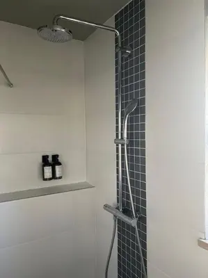 Ein Badezimmer in der Unterkunft City-Apartment mit Garten & Garage