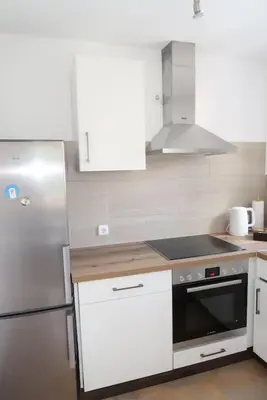 Küche/Küchenzeile in der Unterkunft City-Apartment mit Garten & Garage