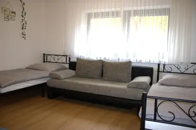 Ein Sitzbereich in der Unterkunft Traumhafte Ferienwohnung Andechs