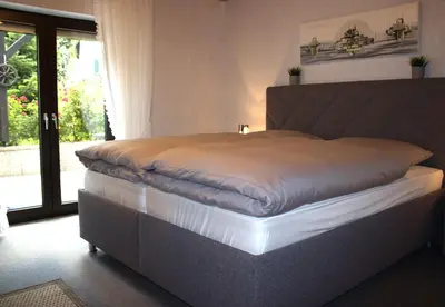 Ein Bett oder Betten in einem Zimmer der Unterkunft Traumhafte Ferienwohnung Andechs