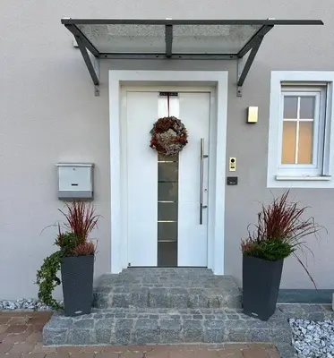 Eine Fassade oder ein Eingang zu Haus am Mühlbach
