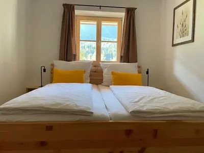 Ein Bett oder Betten in einem Zimmer der Unterkunft FeWo Rainerweber Sunseitn