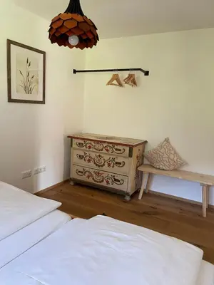 Ein Bett oder Betten in einem Zimmer der Unterkunft FeWo Rainerweber Sunseitn