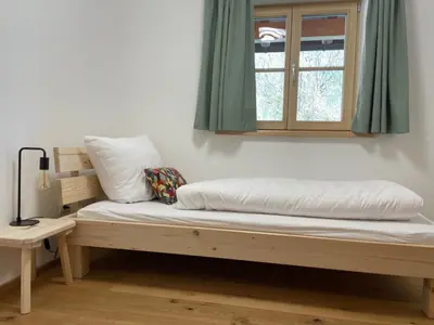 Ein Bett oder Betten in einem Zimmer der Unterkunft FeWo Rainerweber Sunseitn