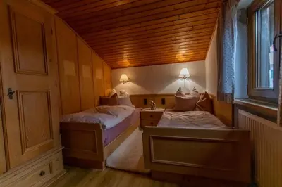 Ein Bett oder Betten in einem Zimmer der Unterkunft Naturpension Rottau