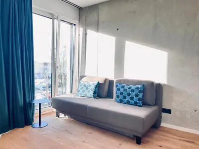 Ein Sitzbereich in der Unterkunft Mikes Apartments Munich