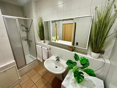 Ein Badezimmer in der Unterkunft muchhome LUXURY APARTMENTS - MuchLoft - Vintage Loft in Bad Tölz mit Freizeitlounge