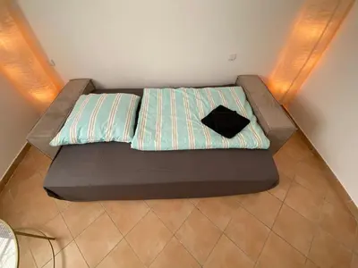 Ein Bett oder Betten in einem Zimmer der Unterkunft Gemütliche Handwerkerwohnung