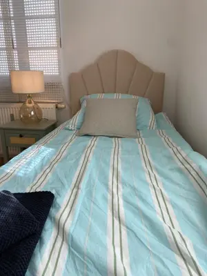 Ein Bett oder Betten in einem Zimmer der Unterkunft Gemütliche Handwerkerwohnung