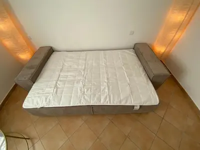Ein Bett oder Betten in einem Zimmer der Unterkunft Gemütliche Handwerkerwohnung