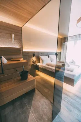 Ein Bett oder Betten in einem Zimmer der Unterkunft LIVALPIN 2Enjoy - with private Sauna