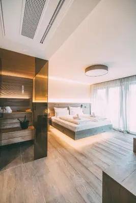 Ein Bett oder Betten in einem Zimmer der Unterkunft LIVALPIN 2Enjoy - with private Sauna