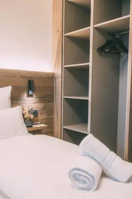 Ein Bett oder Betten in einem Zimmer der Unterkunft LIVALPIN View