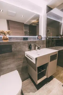 Ein Badezimmer in der Unterkunft LIVALPIN View