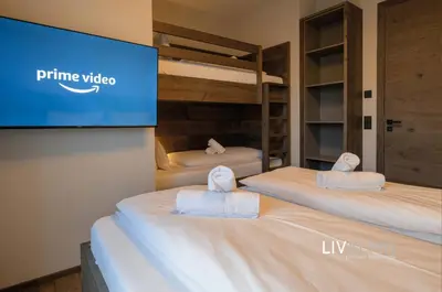 Ein Bett oder Betten in einem Zimmer der Unterkunft LIVALPIN Balance