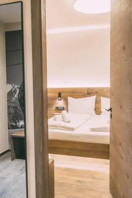 Ein Bett oder Betten in einem Zimmer der Unterkunft LIVALPIN ToGether