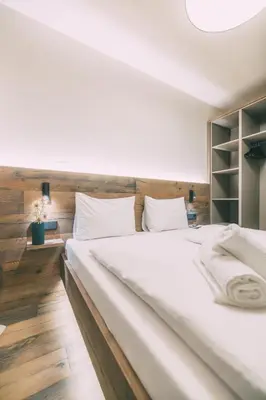 Ein Bett oder Betten in einem Zimmer der Unterkunft LIVALPIN ToGether
