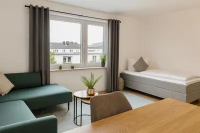 Ein Bett oder Betten in einem Zimmer der Unterkunft SMS-HOMES I Auszeit in Landsberg