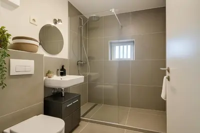 Ein Badezimmer in der Unterkunft SMS-HOMES I Auszeit in Landsberg