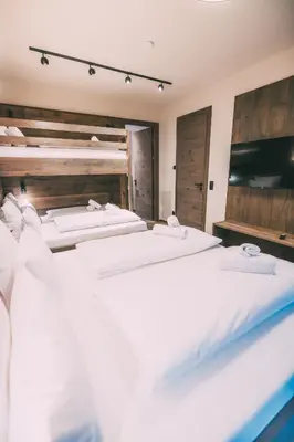 Ein Bett oder Betten in einem Zimmer der Unterkunft LIVALPIN Comfort