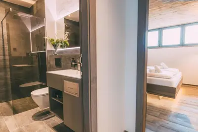 Ein Badezimmer in der Unterkunft LIVALPIN Chalet - with private Sauna & Whirlpool