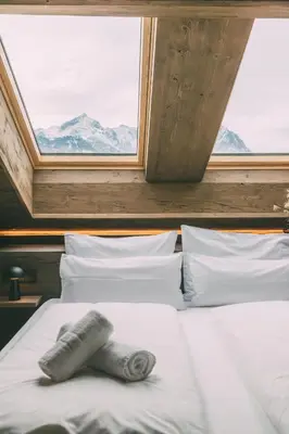 Ein Bett oder Betten in einem Zimmer der Unterkunft LIVALPIN Hideaway