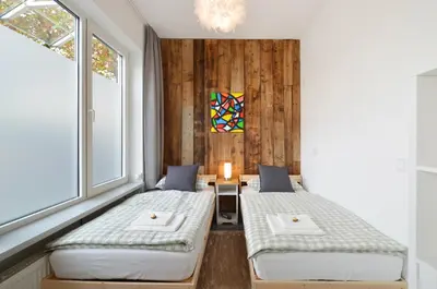 Ein Bett oder Betten in einem Zimmer der Unterkunft City-Jungle ARTcommodation