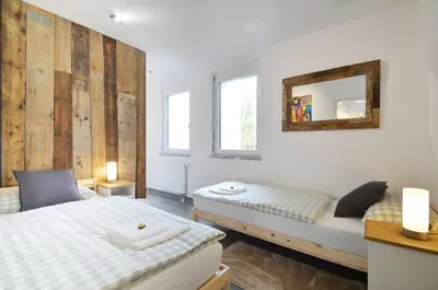 Ein Bett oder Betten in einem Zimmer der Unterkunft City-Jungle ARTcommodation