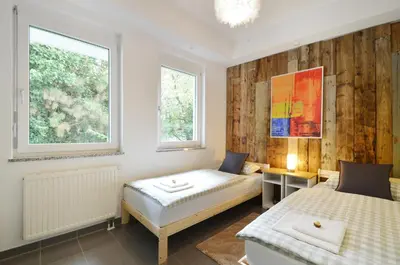 Ein Bett oder Betten in einem Zimmer der Unterkunft City-Jungle ARTcommodation