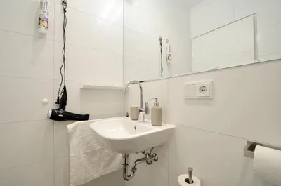 Ein Badezimmer in der Unterkunft City-Jungle ARTcommodation