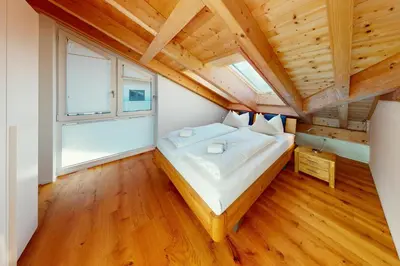 Ein Bett oder Betten in einem Zimmer der Unterkunft HöhenRausch